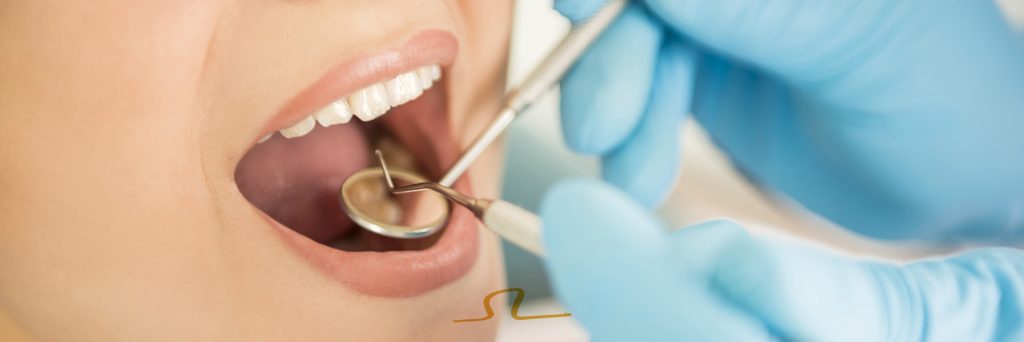 revisión dental y periodoncia en De Vicente Ortodoncia en Granada
